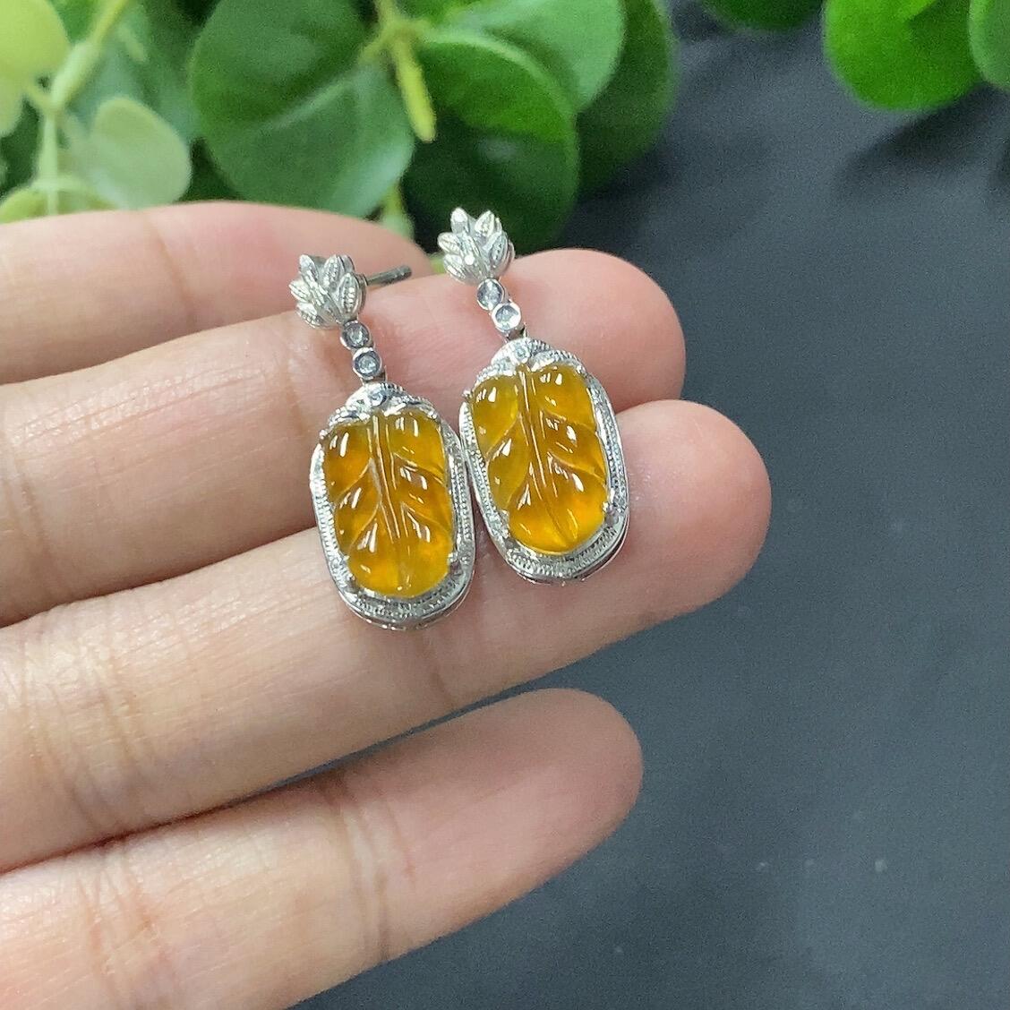 A pair of 18K gold inlaid jade earrings, total weight 3 grams