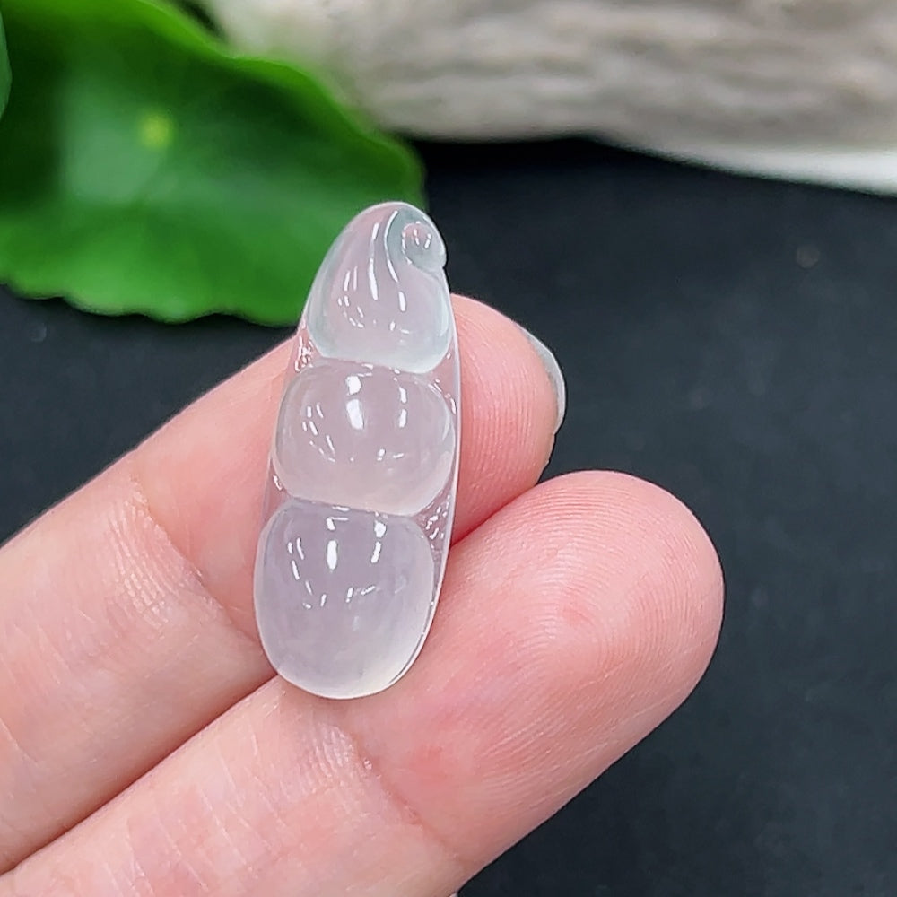 Jadeite Lucky Bean Pendant from HKHQ showing a smooth, green jade pendant with carved details, weighing approximately 3.2g.