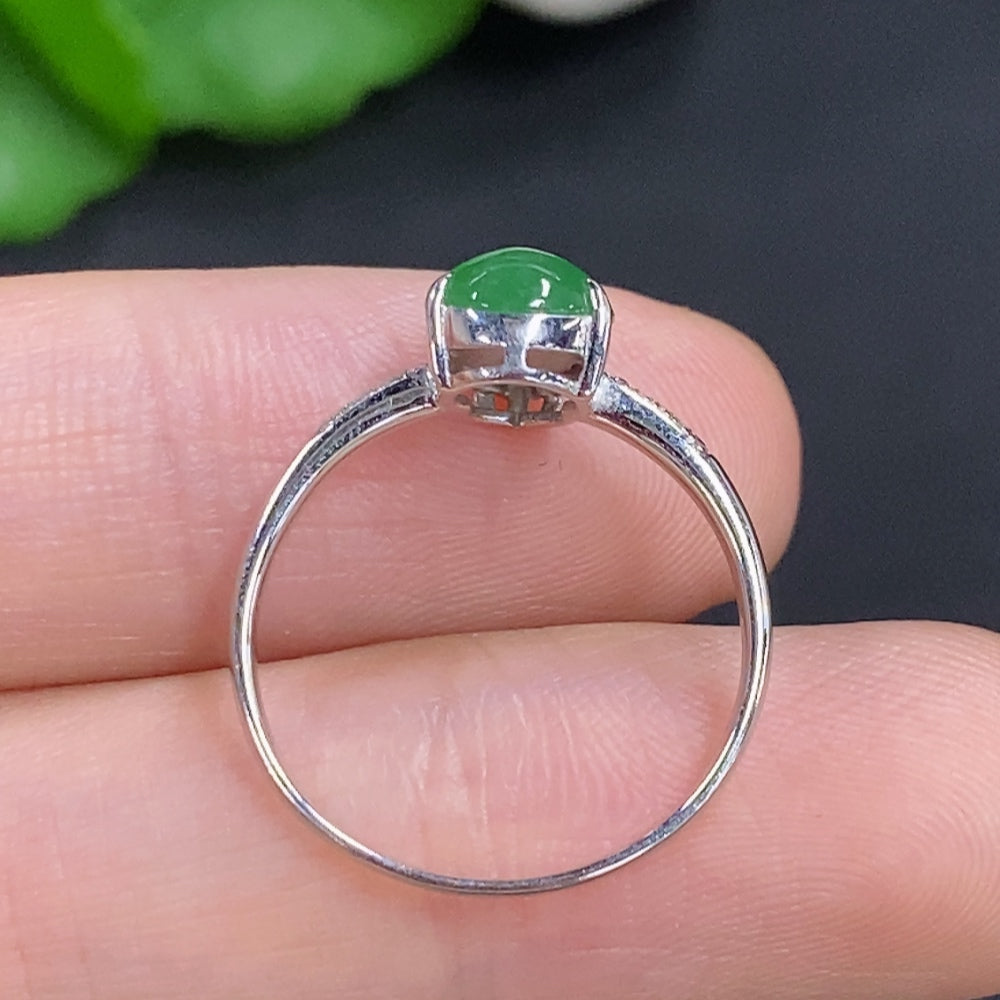 Jadeite gourd inlay ring by HKHQ with 18K gold band, diamond accents, size 13 and approx. 2g weight shown on white background.