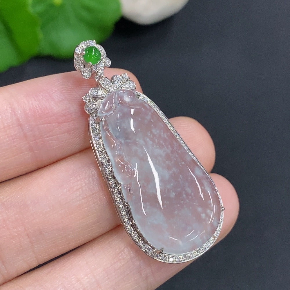 Jadeite auspicious gourd pendant with 18K gold accents and diamond details, showcasing a polished jade design with intricate craftsmanship.