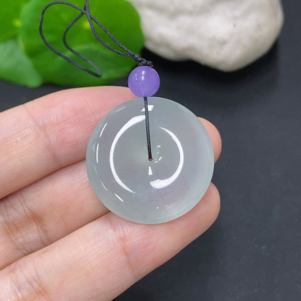 Jadeite Peace Knot jewelry piece from HKHQ, approximately 7.6 grams, featuring intricate jade beads with a peaceful design.