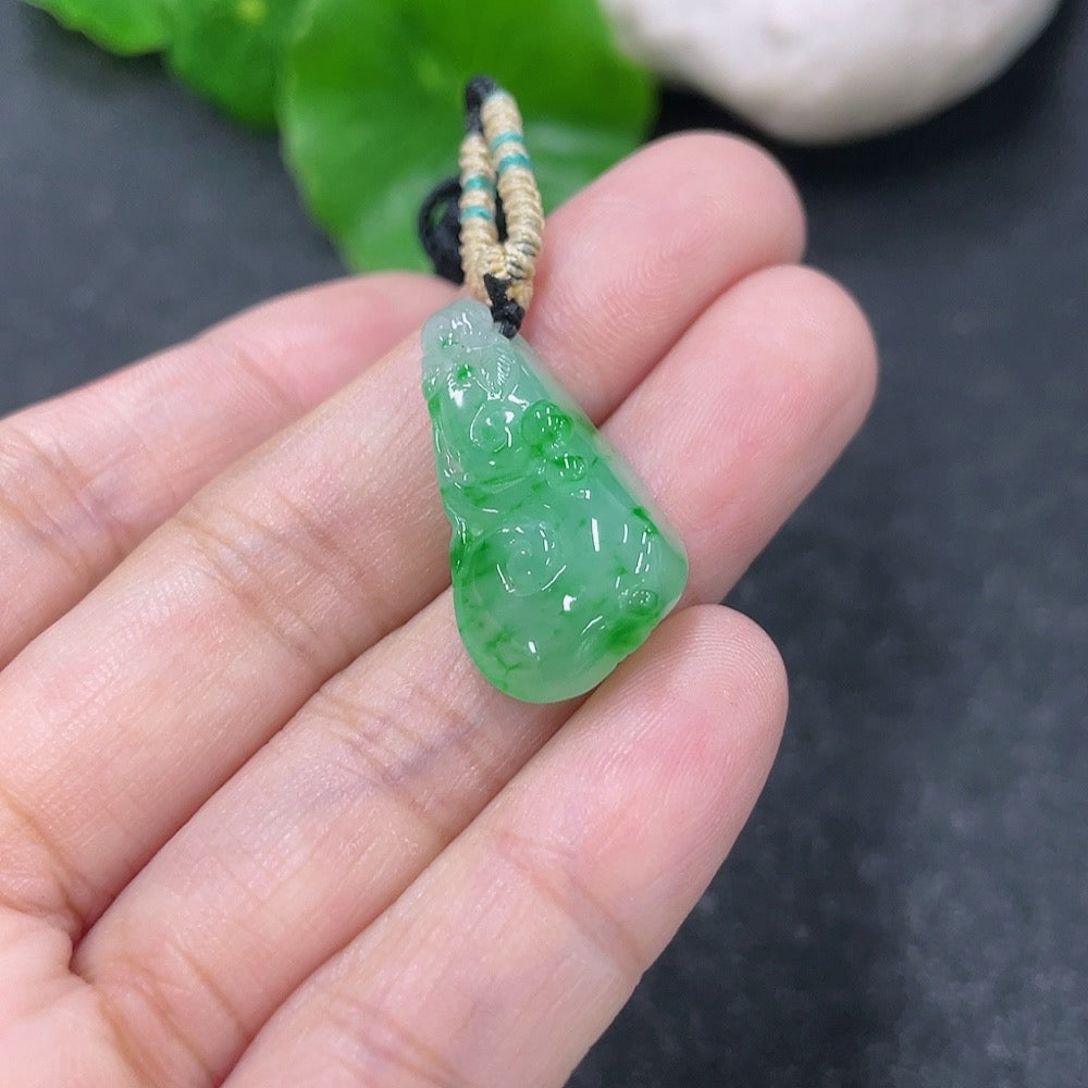 Jadeite pendant with Ruyi design, weighing approximately 4.45g, featuring a jade jadeite stone and included rope, by HKHQ.