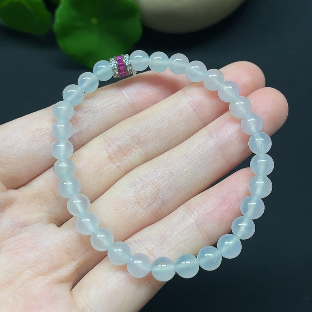 HKHQ jadeite bracelet with non-gold beads, total weight 10.66g, bead size 5.8mm, showcasing smooth, polished jade beads.