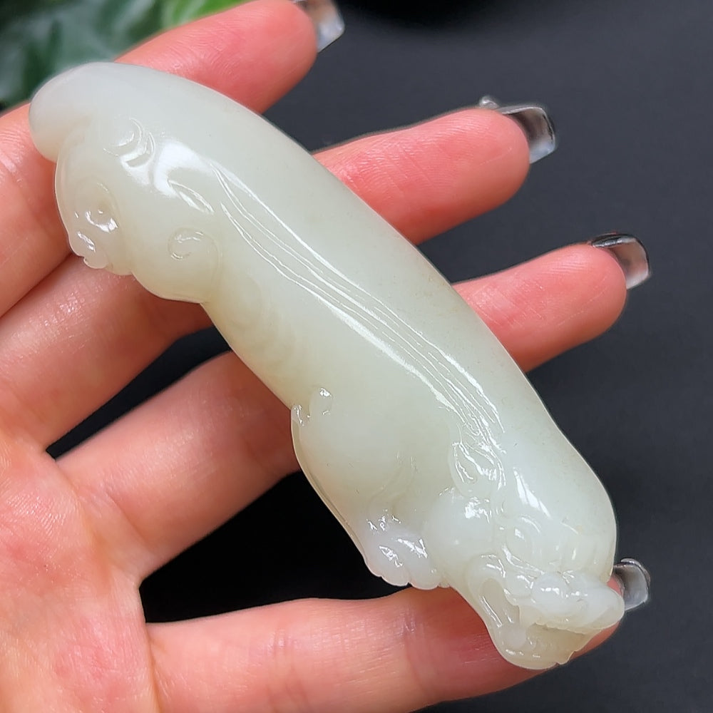 Hetian jade Pixiu pendant from HKHQ, crafted in green jade, weighing approximately 80g, featuring intricate traditional design.