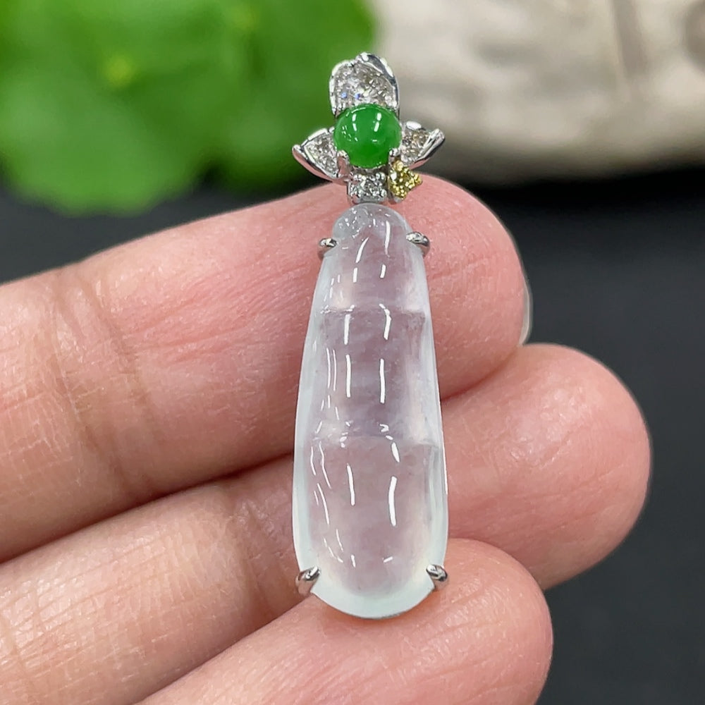 Jadeite blessed bean pendant with 18K gold setting and diamond accents, crafted by HKHQ, showing intricate design and gold details.
