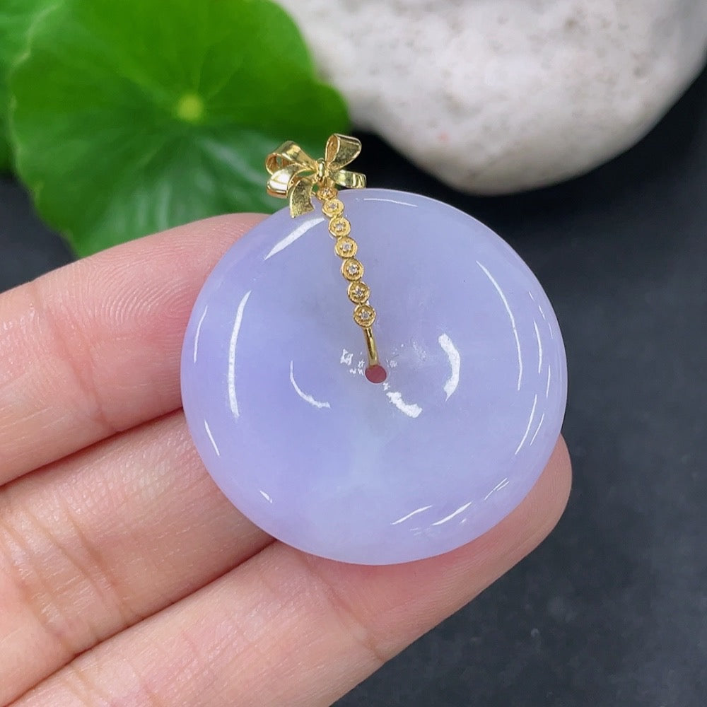 Jadeite pendant with peace buckle design, 18K gold accents, diamond details, crafted by HKHQ, weighing approximately 9.9g.