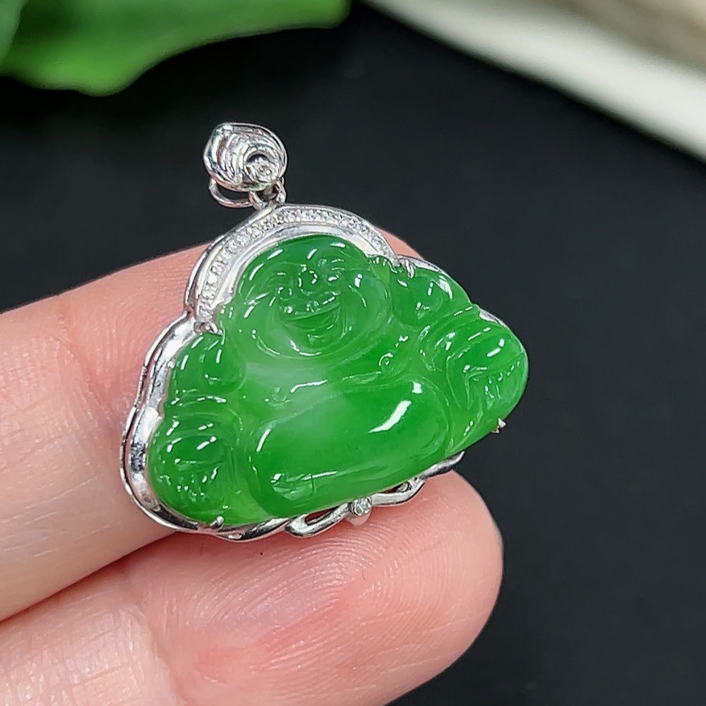 Jadeite Buddha pendant with 18K gold mount, diamond accents, lightweight 2.5g, showcasing intricate craftsmanship and rich green jade.