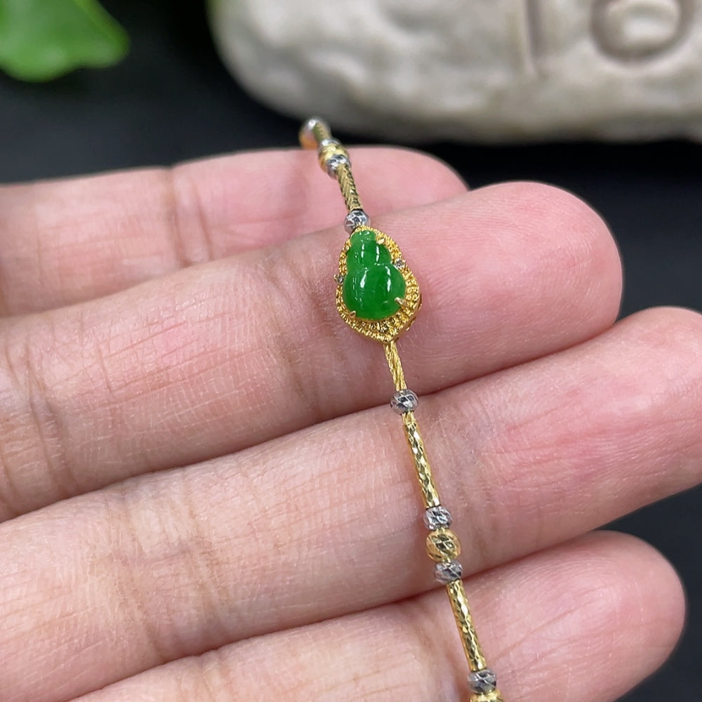 Jadeite gourd bracelet by HKHQ with 18k gold inlay and diamond accents, lightweight and intricately crafted jewelry piece.