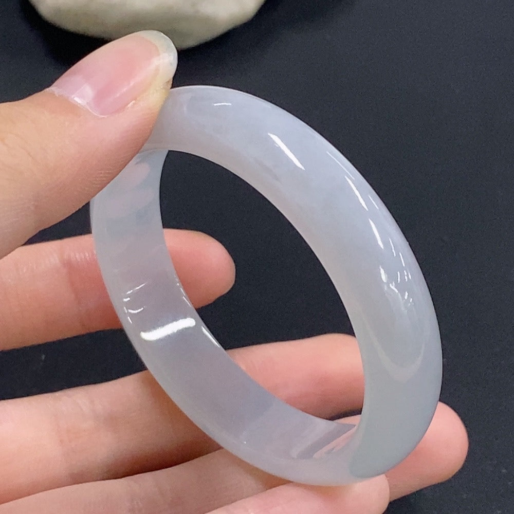 HKHQ jadeite oval bangle in size 51.6 with a weight of 31.71g, showcasing smooth, polished jadeite bracelet design.
