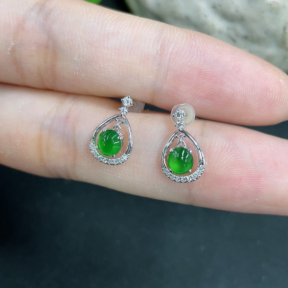 HKHQ jadeite earrings with 18k gold and diamond accents, delicate jewelry featuring smooth green jade and sparkling stones.