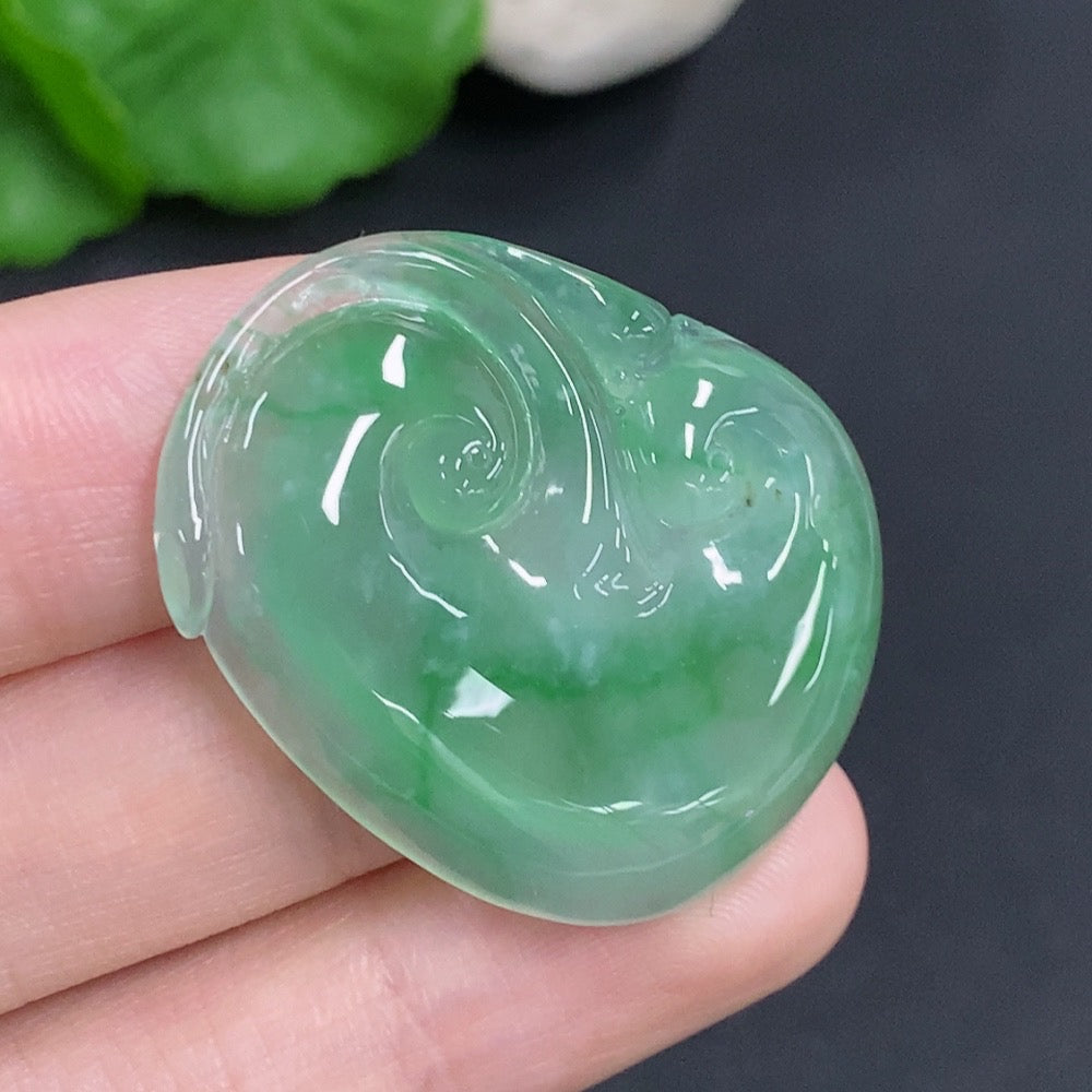 Jadeite Ruyi pendant with intricate carvings, weighing approximately 10.5g, crafted from high-quality jade by HKHQ.