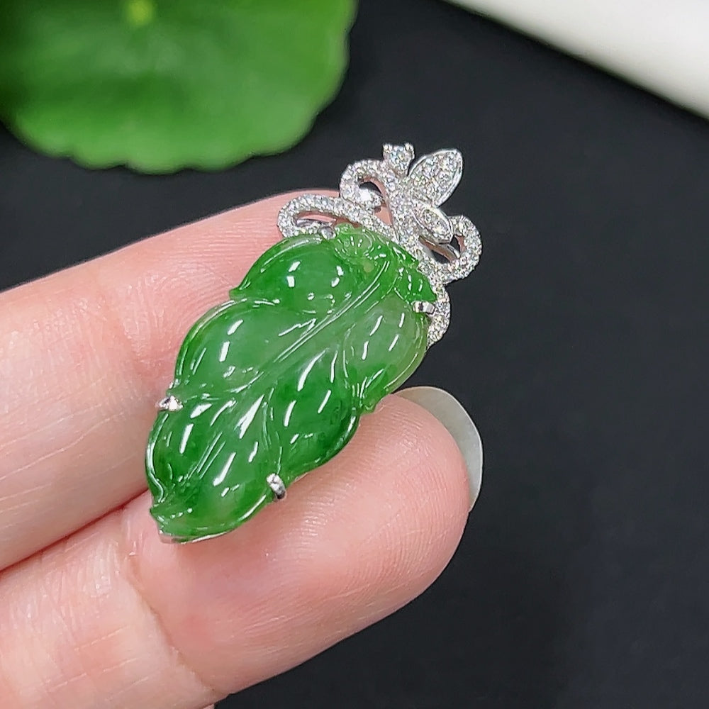 Jadeite leaf inlay pendant with 18K gold and diamond accents, weighing approx. 3.5g, featuring detailed jade jewelry design.