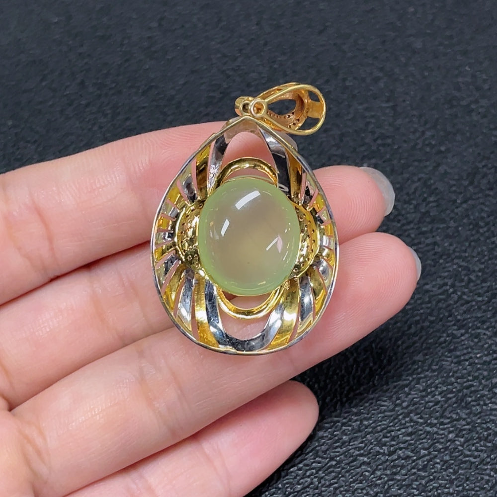Prehnite pendant with 18K gold setting and diamond accents, elegant jewelry necklace featuring a smooth green stone and sparkling details.