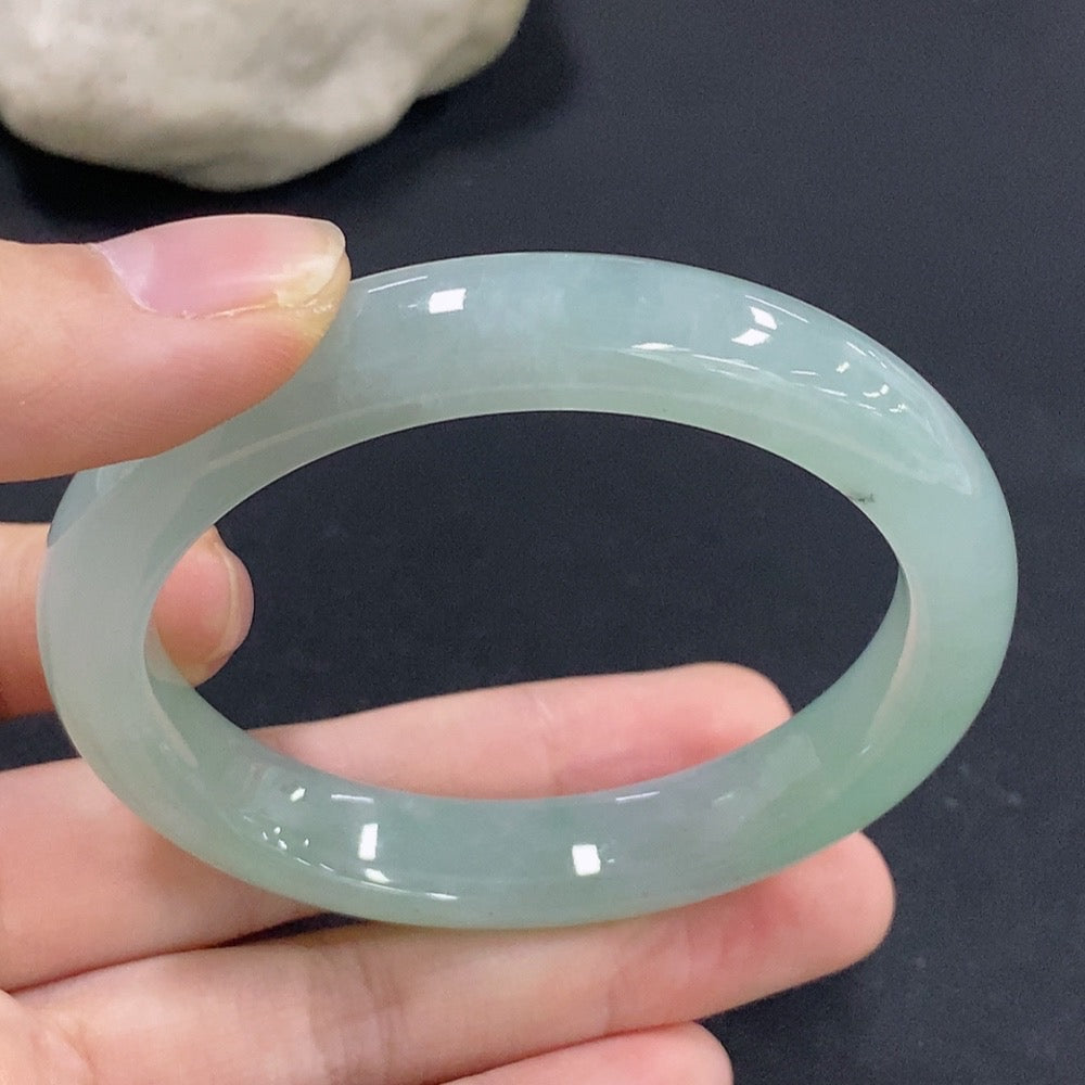 Jadeite round bracelet with size 55, weighing approximately 49.08g, featuring smooth green jade stones, by HKHQ.