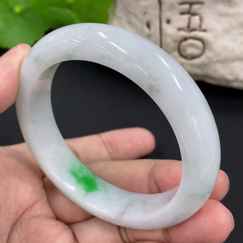 HKHQ jadeite round bangle in size 52.7 with a weight of 53.25g, showcasing smooth, polished jadeite craftsmanship.