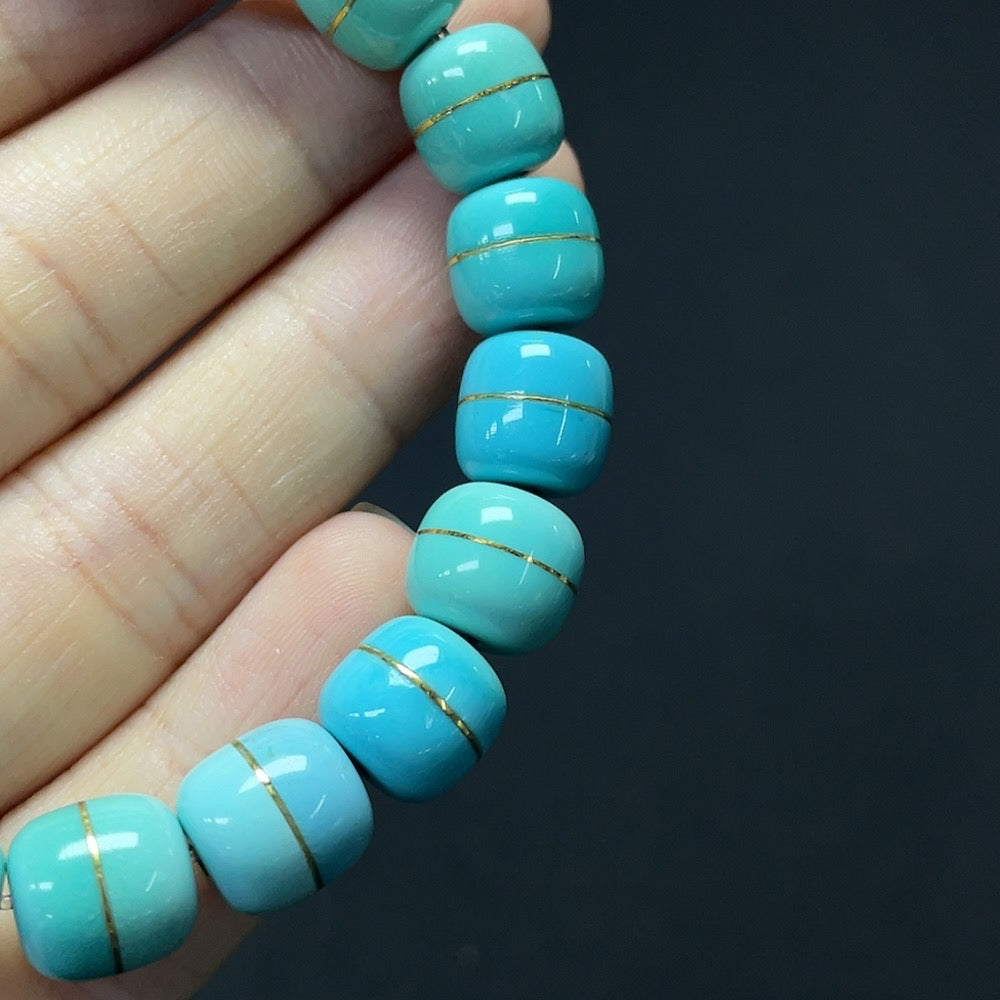 Turquoise gemstone bracelet with 37% gold content, featuring stone inclusions, approx. 8.9-10.7mm, weight 26.98g, by HKHQ.