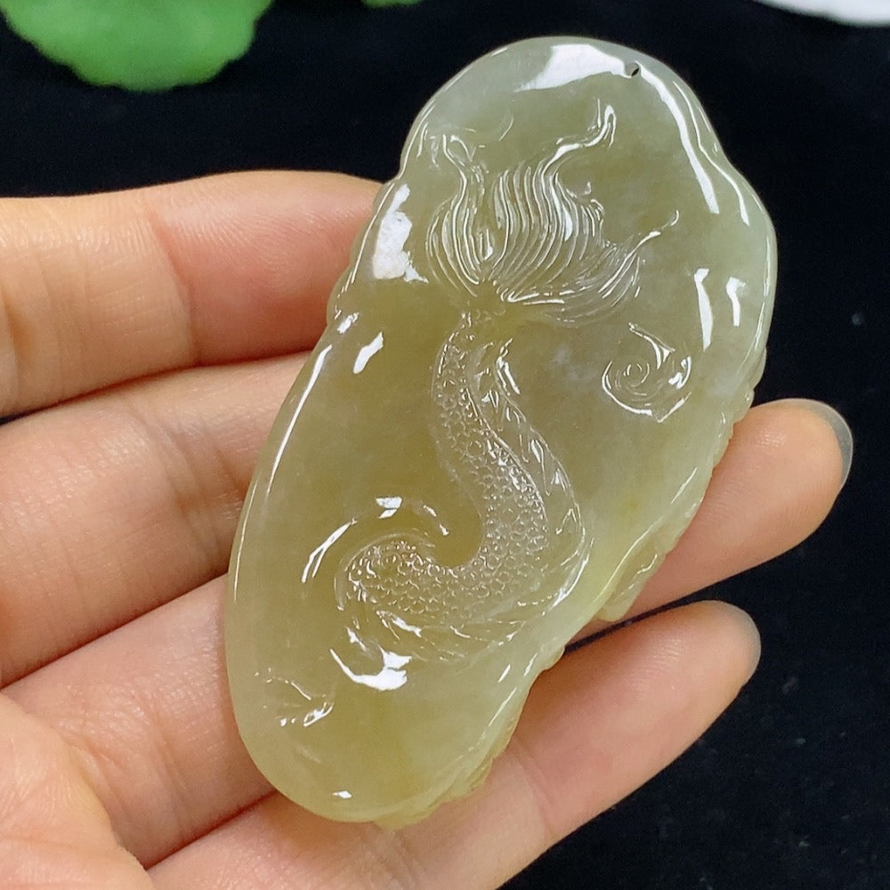 Jadeite dragon pendant from HKHQ, carved jade jewelry weighing approximately 34.71 grams, featuring intricate dragon details.