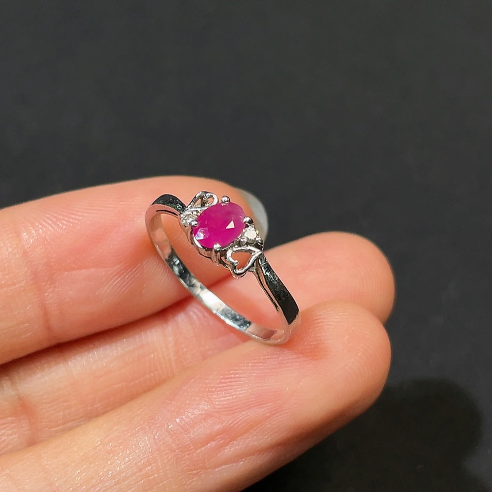 HKHQ Ruby ring with diamond accents, platinum 87%, size 14, showcasing vibrant ruby gemstones and sparkling diamond details.