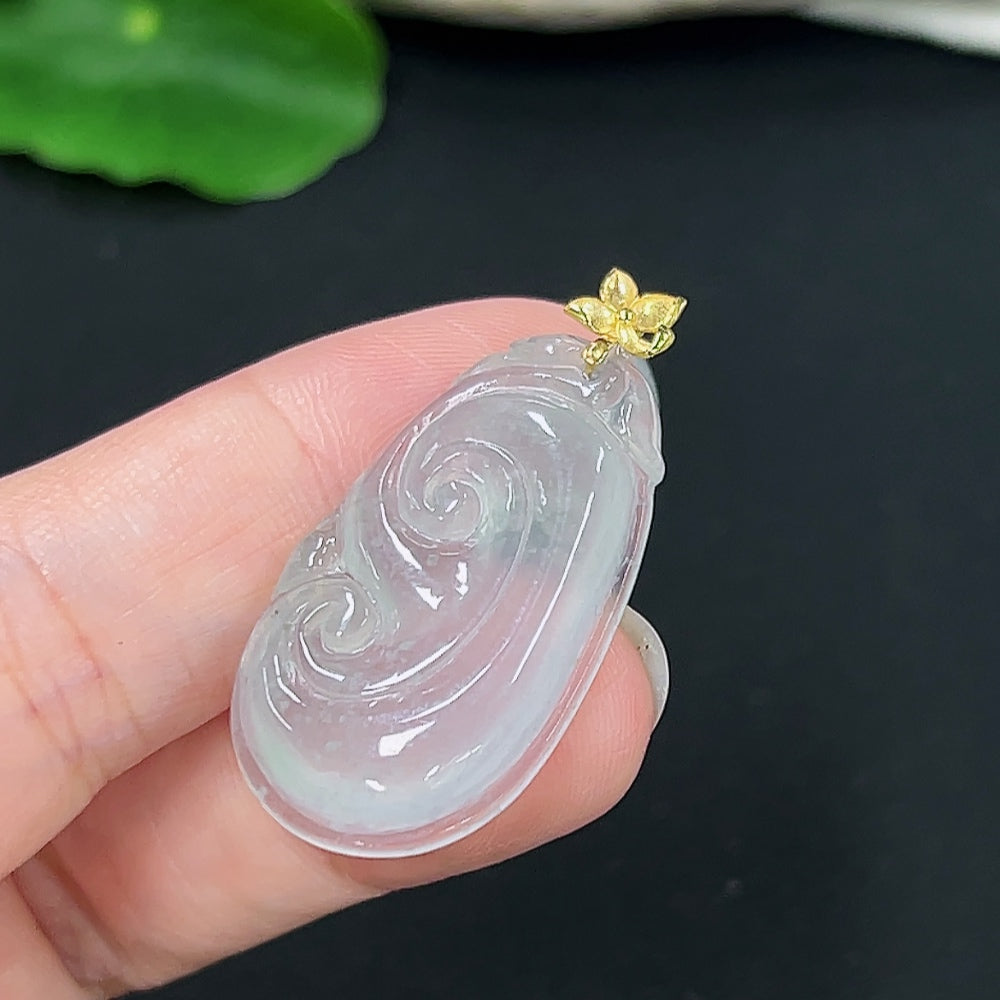 Jadeite Ruyi pendant in 18K gold, weighing approx. 4.8g, featuring intricate craftsmanship, on a necklace chain.