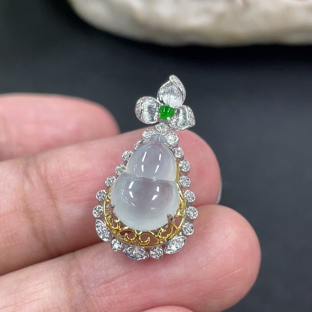 Jadeite gourd pendant necklace by HKHQ featuring 18K gold and diamond accents, showcasing intricate craftsmanship and elegant design.
