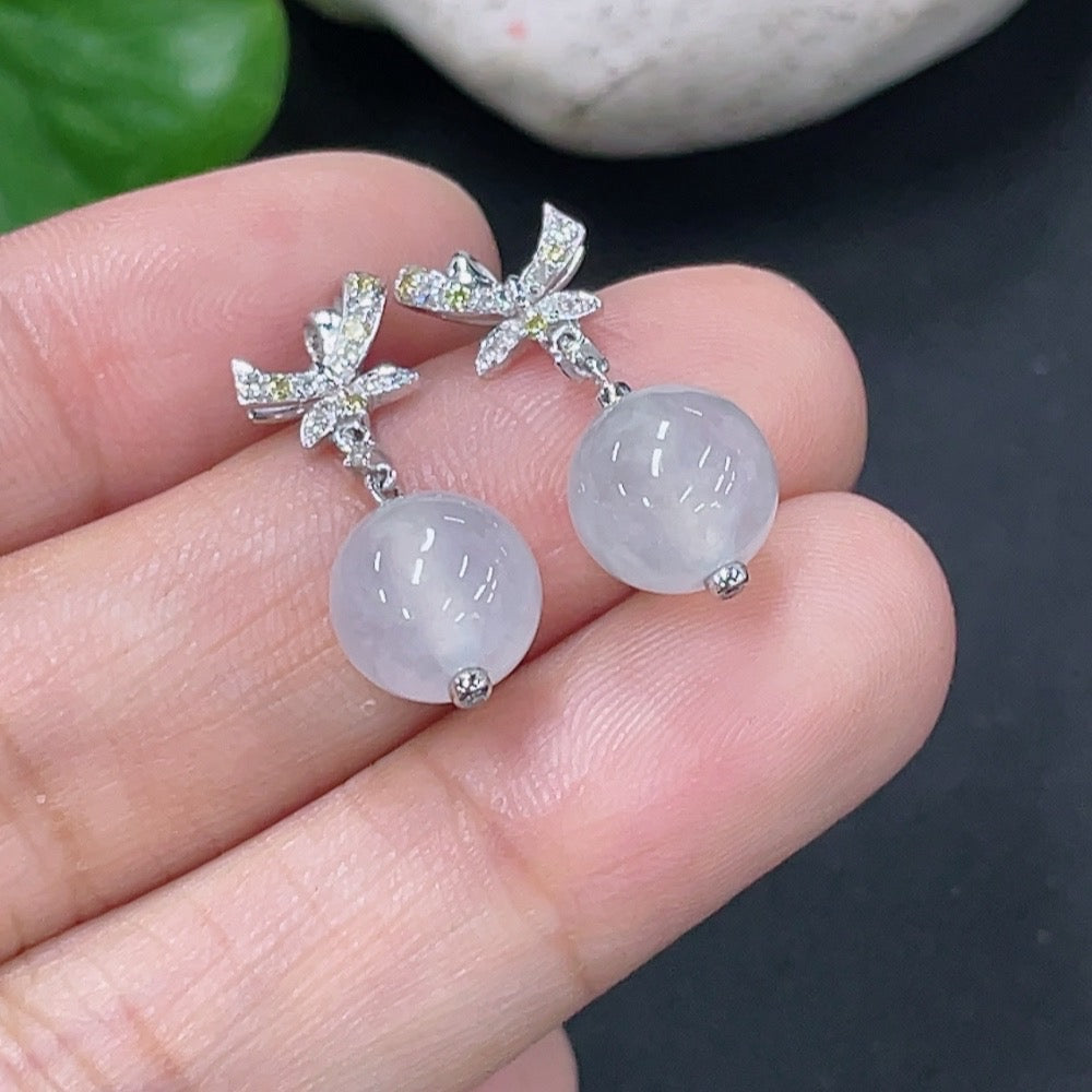 Jadeite earrings set in 18k gold with diamond accents, total product weight approximately 3.07g