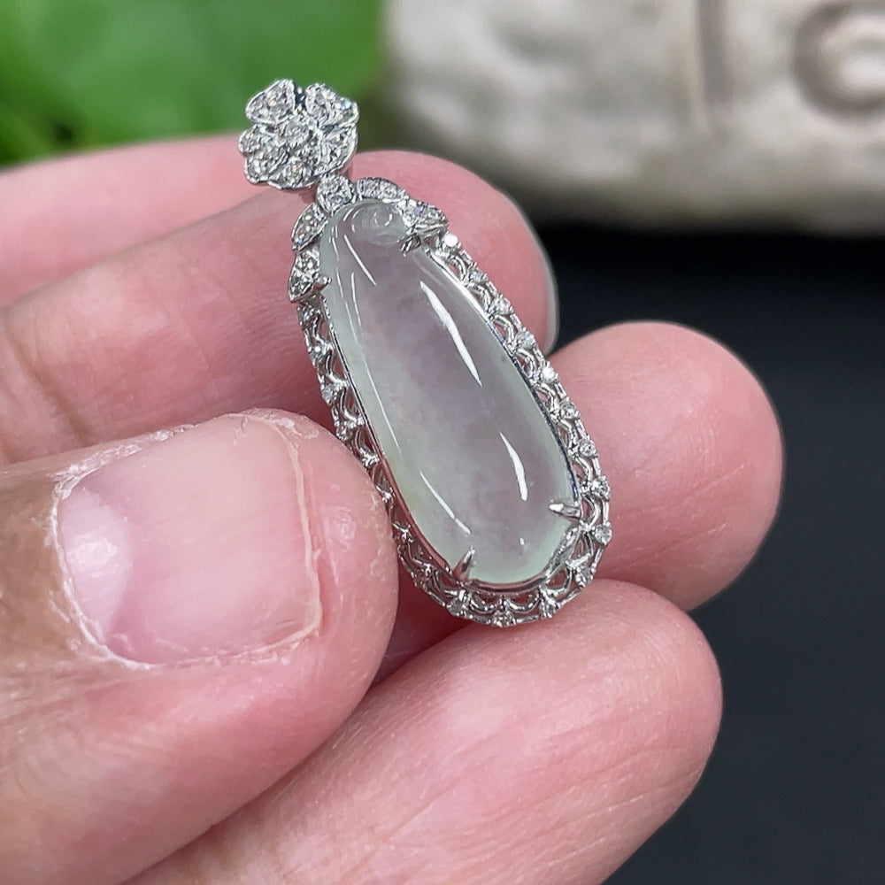 Jadeite blessing melon pendant in 18K gold set with diamonds, featuring intricate jade carving and a delicate gold chain.