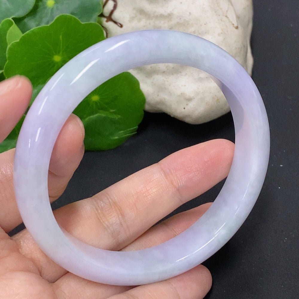 Jadeite round bangle with a total weight of 54.8g and size 59.7, featuring smooth, polished green jadeite from HKHQ.