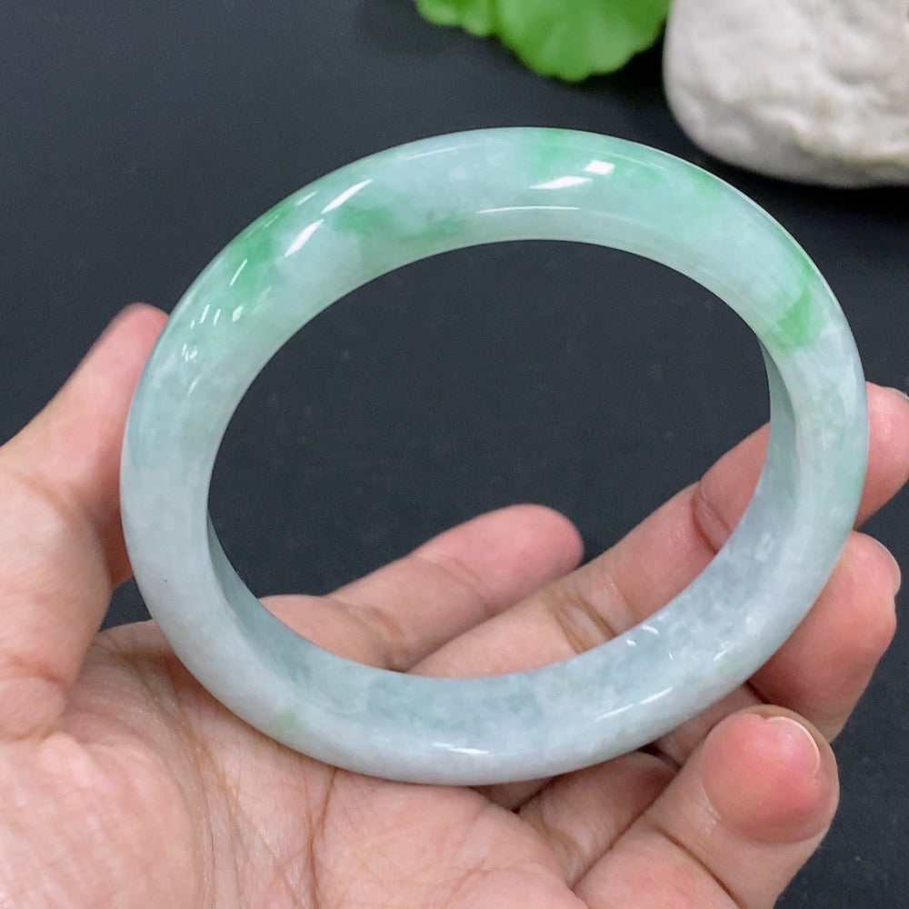 HKHQ jadeite round bracelet, 54.3mm diameter, weighs 48.45g, featuring smooth, polished green jade stones on a string.