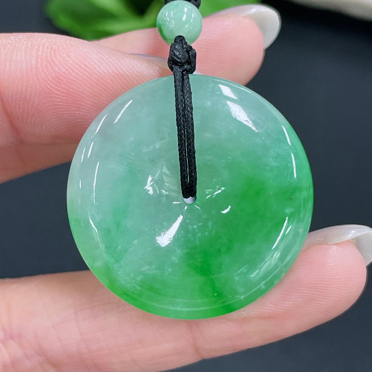 Jadeite pendant with peace knot design on cord, HKHQ jade jewelry, approximately 17.53g, non-grade A jade beads.