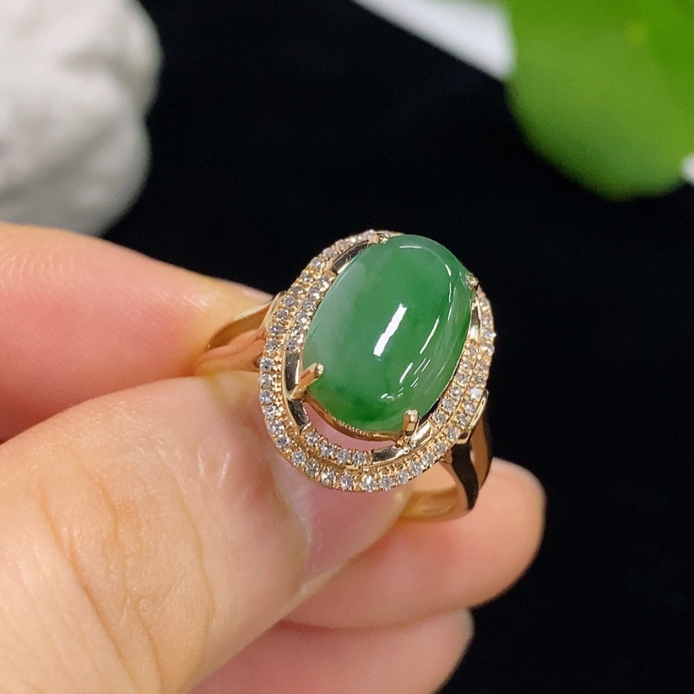 Jadeite cabochon inlaid ring with 18K gold setting and diamond accents, size 15, by HKHQ.