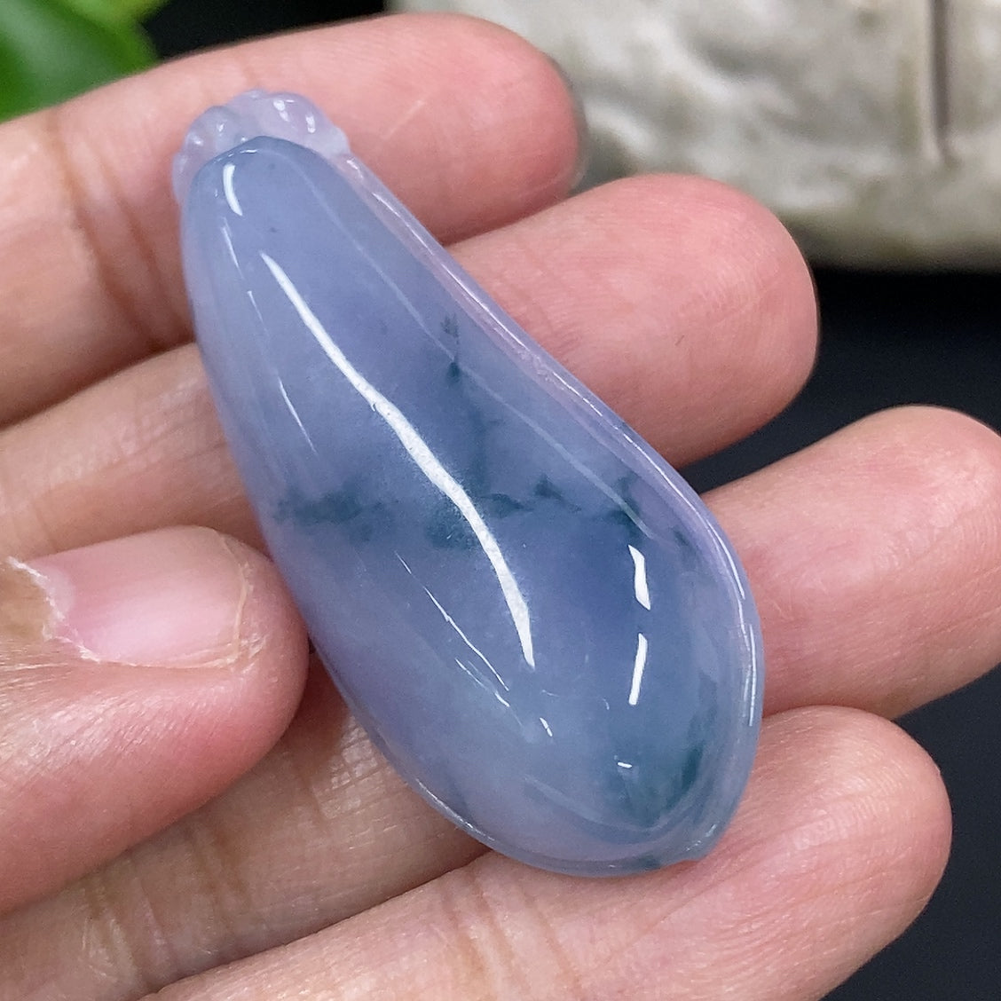 Jadeite auspicious gourd pendant from HKHQ with intricate carvings, weighing approximately 10.4g, shown against a neutral background.