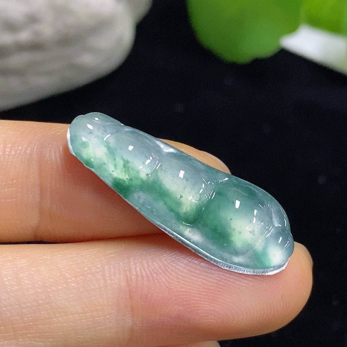 Jadeite lucky bean inlay jewelry piece from HKHQ, featuring vibrant green jadeite with intricate inlay design.