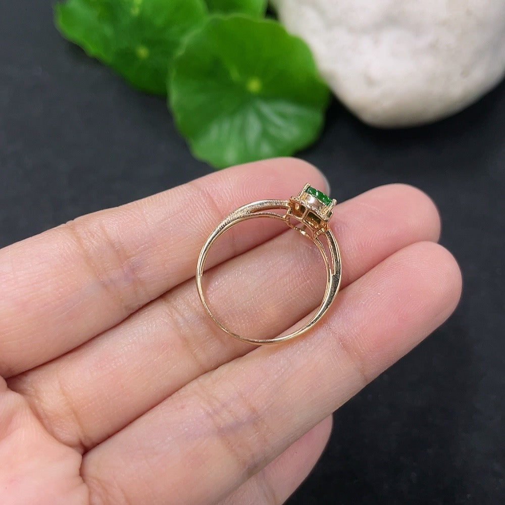 Jadeite and diamond ring in 18k gold, size 14, featuring a detailed design with sparkling gemstones and a polished finish.