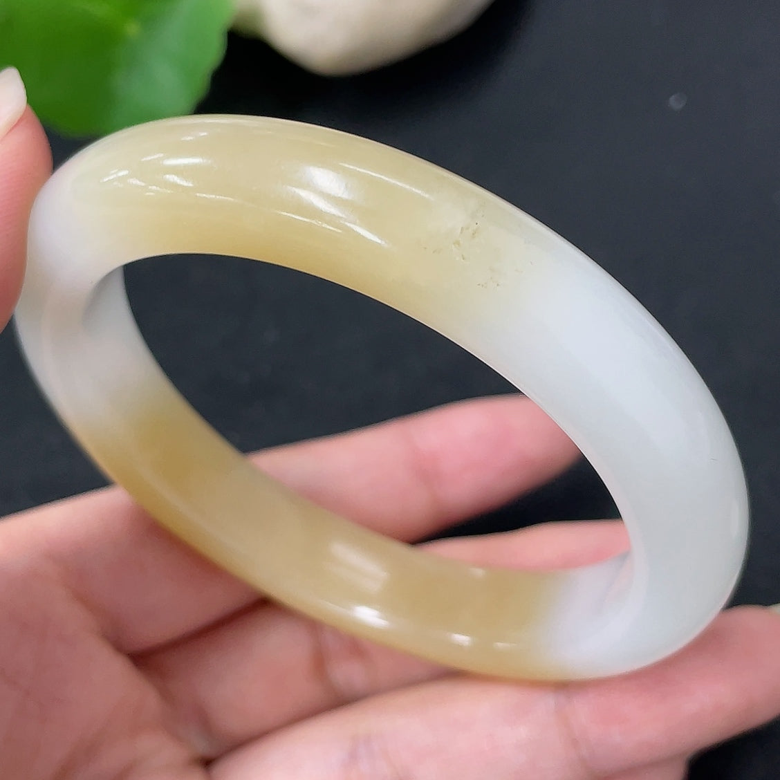 Hetian Jade round bracelet with 57.3mm size and 52.5g weight, crafted by HKHQ, showcasing smooth, polished jade beads.