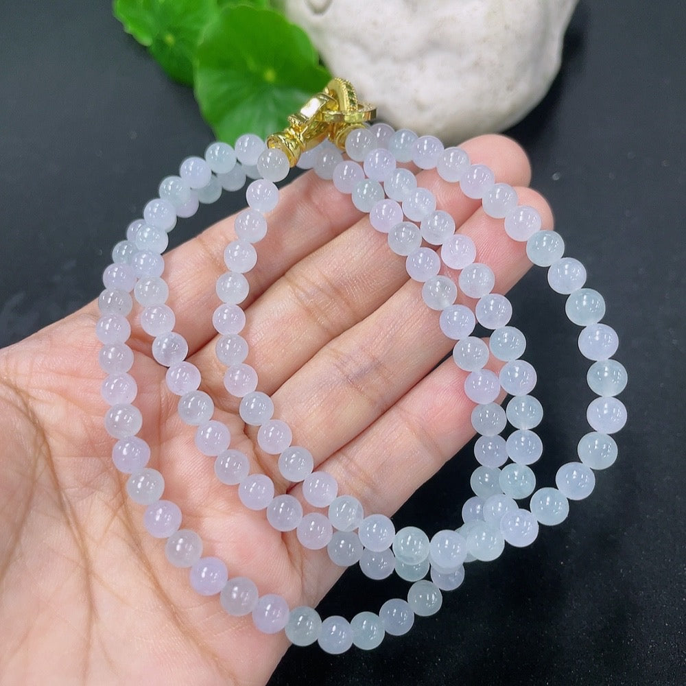 HKHQ jadeite bead necklace with 5.2mm jade beads, non-gold, weighing approximately 32.1 grams, displayed in a close-up shot.