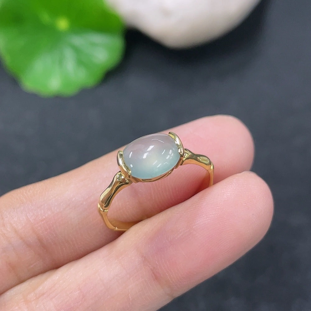 Jadeite inlaid ring by HKHQ, 18k gold, size 13, with intricate jadeite detailing, weighs approximately 2.27 grams.