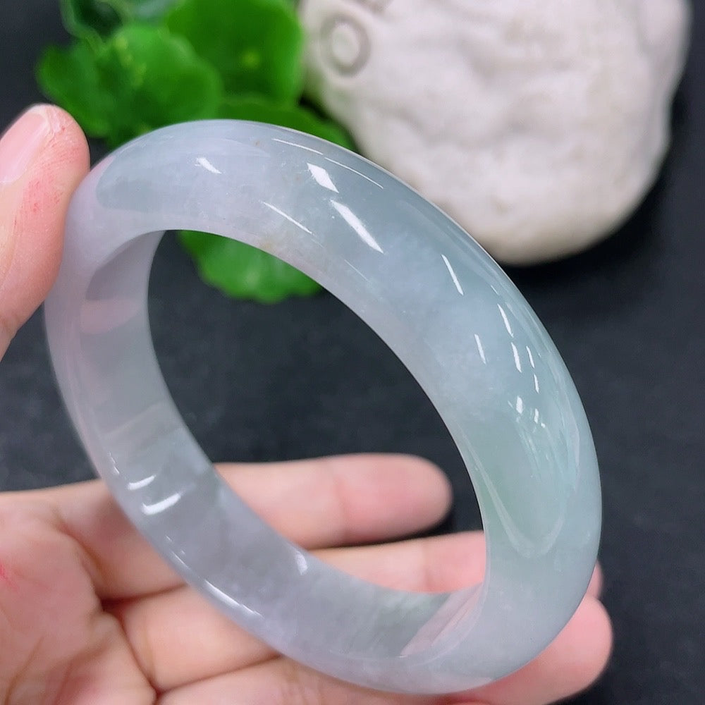 Jadeite round bracelet with 54mm diameter, weighing approximately 59.81g, featuring smooth, polished jade stones.