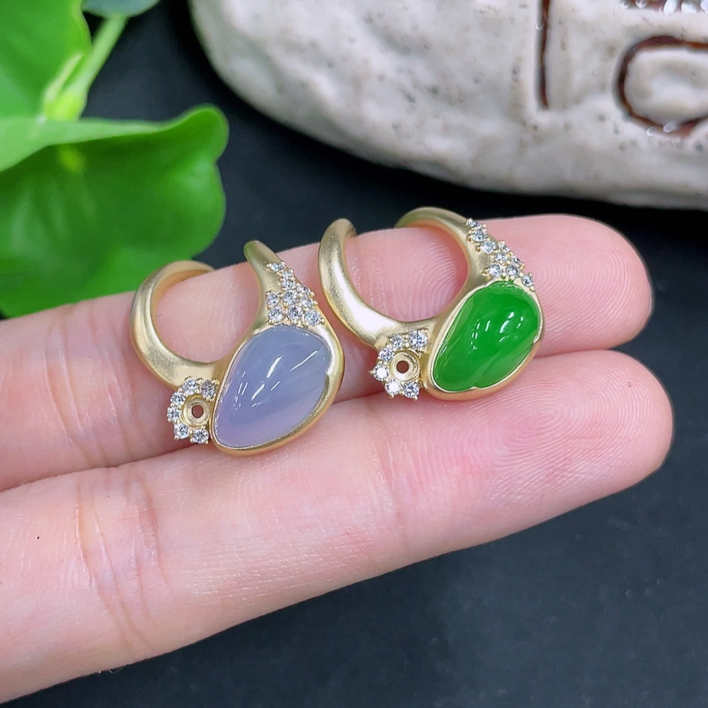 Jadeite inlaid ring with 18k gold band and diamond accents, featuring unmarked HKHQ craftsmanship, shown on a white background.