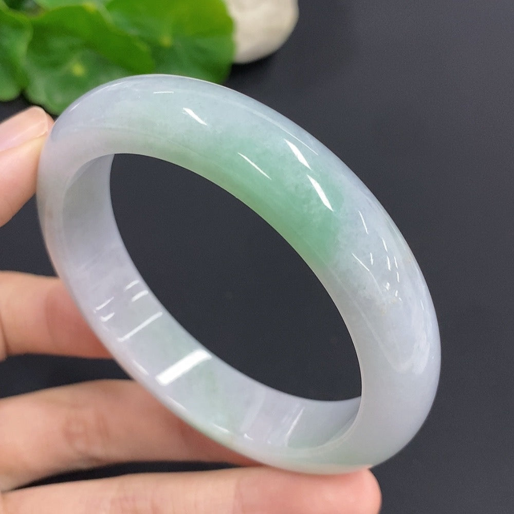HKHQ jadeite round bangle, 61.2g, size 57, smooth green jade jewelry displayed on a neutral background.
