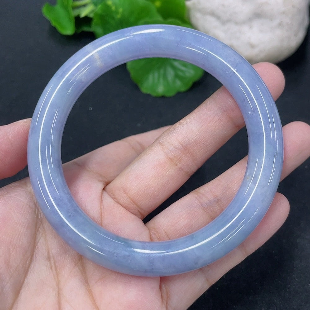 Jadeite round bangle with 56mm diameter, weighing 54g, showcasing smooth green jade surface and polished finish.