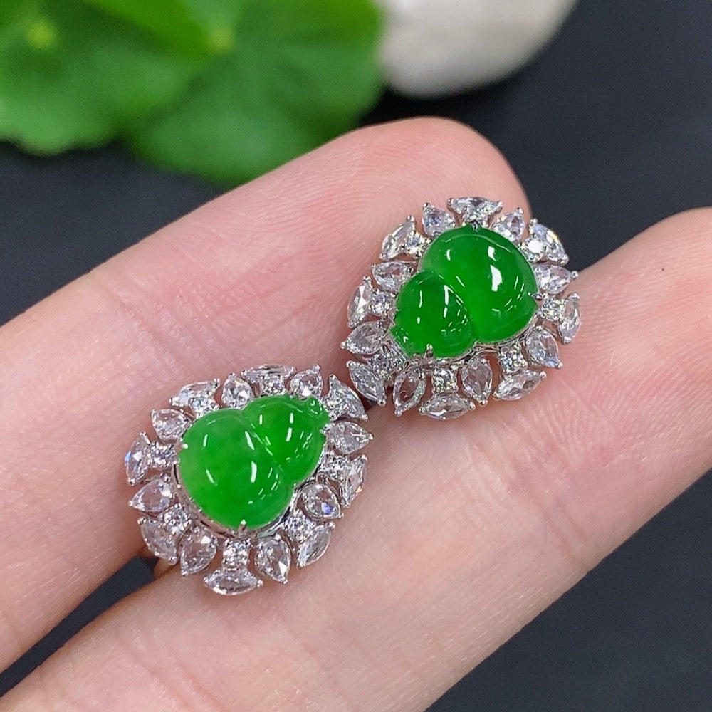 Jadeite gourd earrings by HKHQ featuring 18K gold and diamond accents, showcasing intricate design and elegant craftsmanship.
