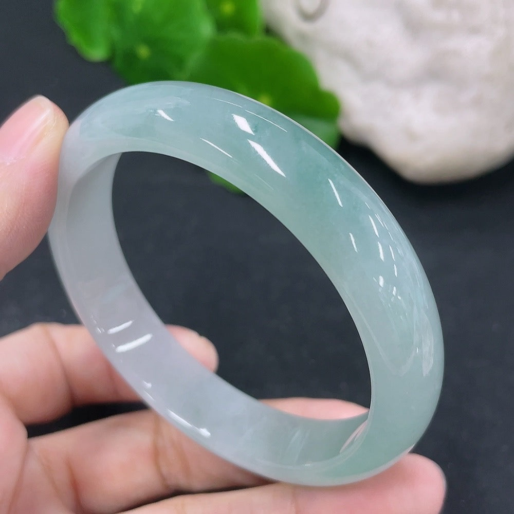 Jadeite round bracelet by HKHQ, measuring 52.5mm, with a total weight of 39.27g, featuring smooth, polished green jade beads.