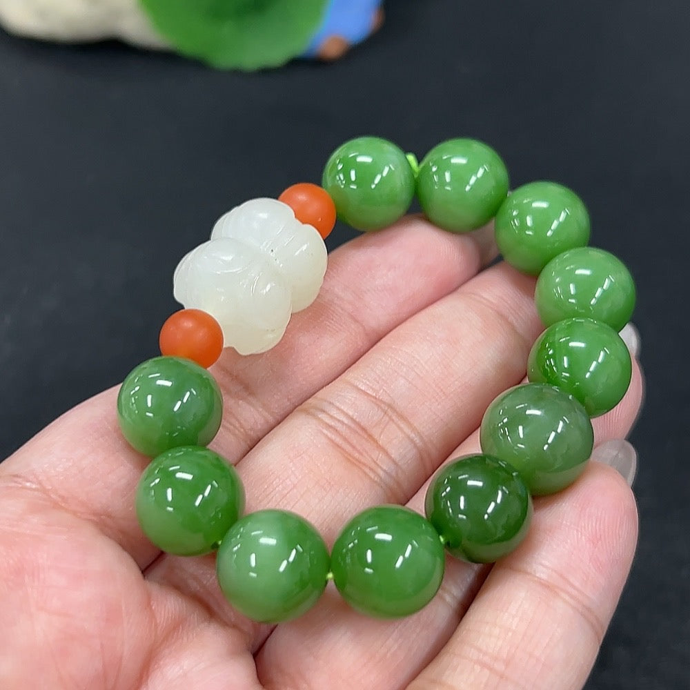 HKHQ Hetian Jade Jasper bracelet with 11.7mm beads, showcasing smooth, polished jade stones in a stylish jewelry piece.