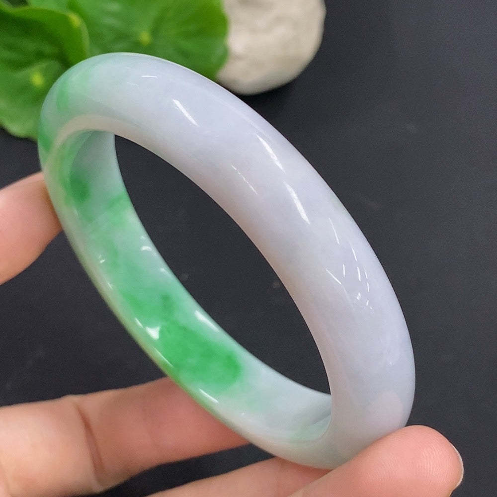 HKHQ jadeite round bangle, 60.6g, size 57.3, crafted from smooth green jadeite, displayed on a clean background.