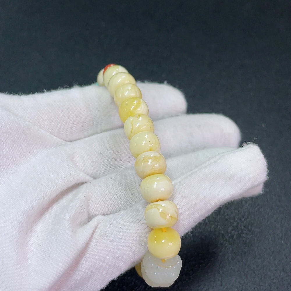 Amber Beeswax Bracelet with Hetian Jade (stone setting may be non-natural), total weight approx. 16.52g, size about 10mm