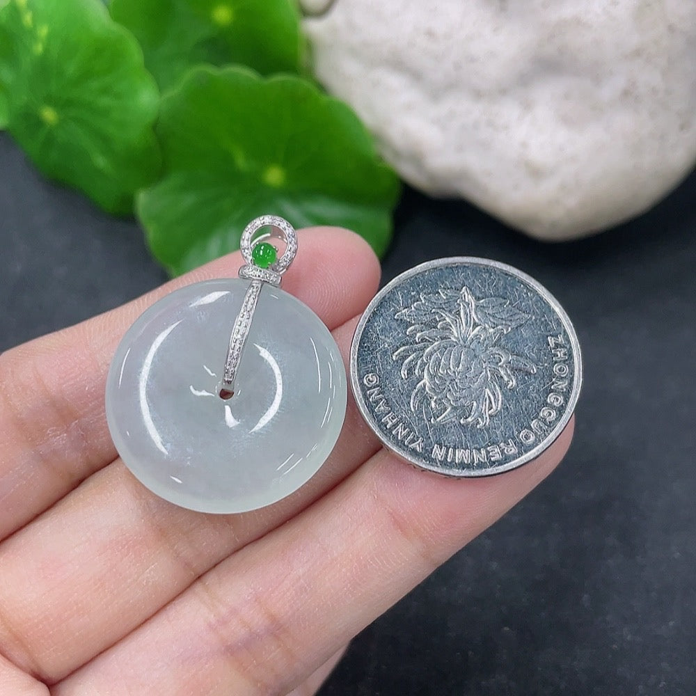 Jadeite pendant with peace knot design, 18k gold setting, diamond inlay, crafted by HKHQ, shown with intricate details and polished finish.