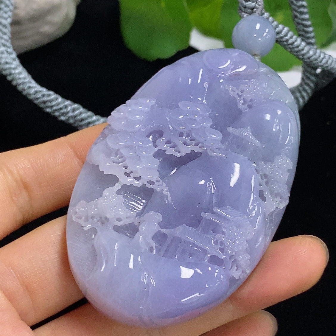 Jadeite pendant featuring a landscape design with rope loop, weighing approximately 110.3g, crafted by HKHQ.