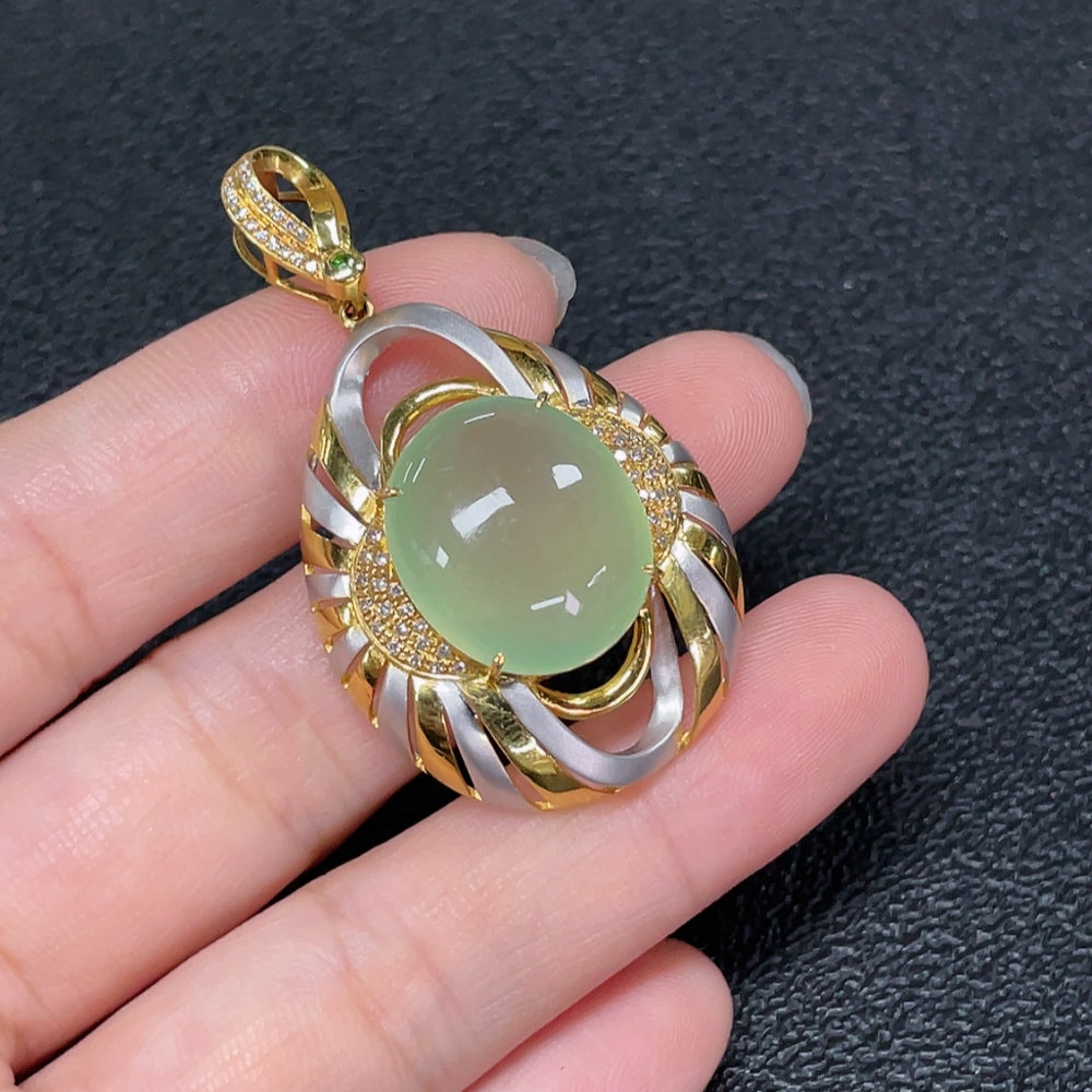 Prehnite pendant with 18K gold setting and diamond accents, showcasing elegant jewelry design on a necklace.