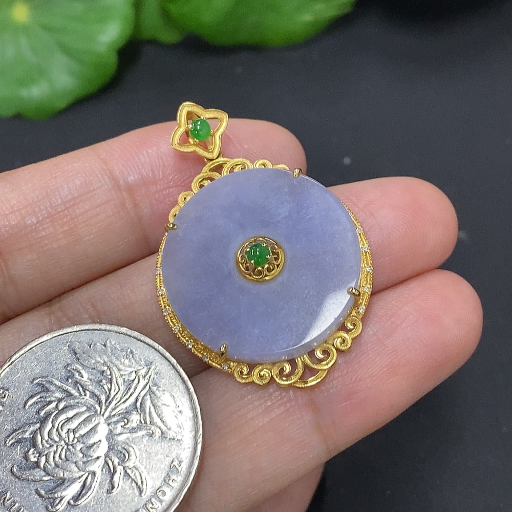 Jadeite inlaid pendant with 18K gold setting, crafted by HKHQ, showcasing a smooth jade stone on a delicate chain.