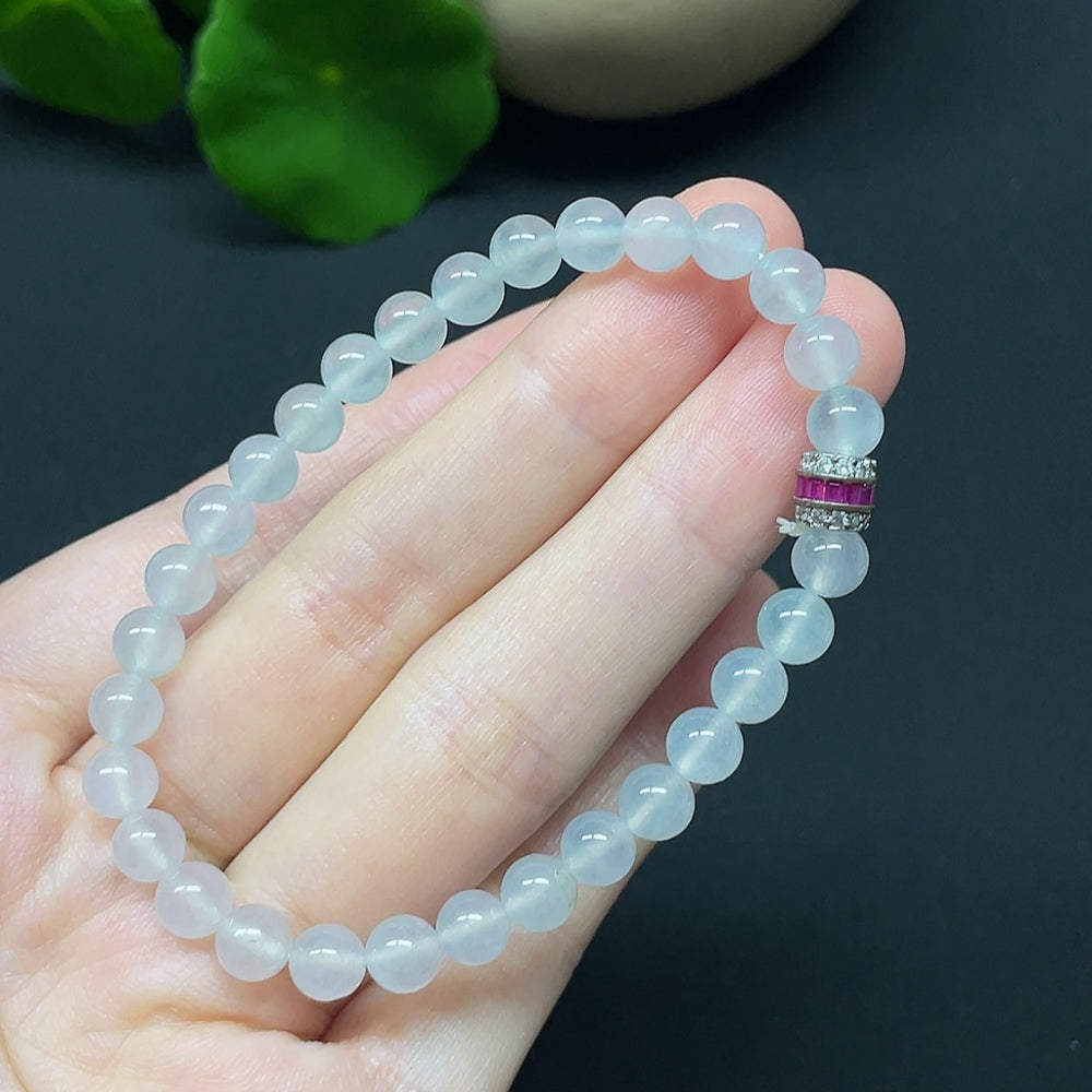 HKHQ jadeite bracelet with non-gold beads, total weight 10.66g, bead size 5.8mm, featuring smooth jade stones.